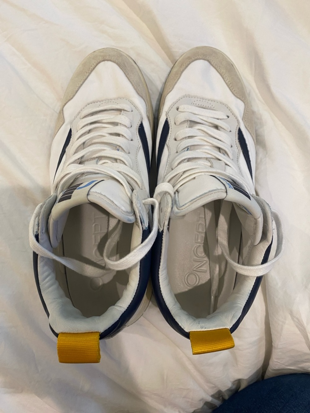 White and Navy woman’s Athletic Sneakers with Yellow Heel Tab